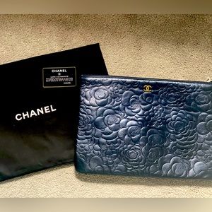 Authentic Chanel Camelia O Case black